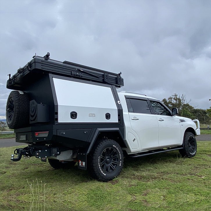 Load image into Gallery viewer, XTR Canopy 3/4 rear view on Y62 Dual Cab with touring setup and off-road gear