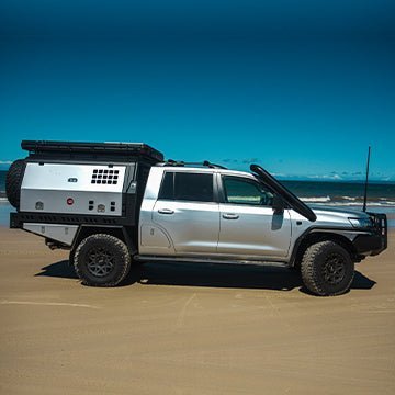 Side profile of a 200 Series Dual Cab conversion and aluminium XTR Canopy and matching tray.