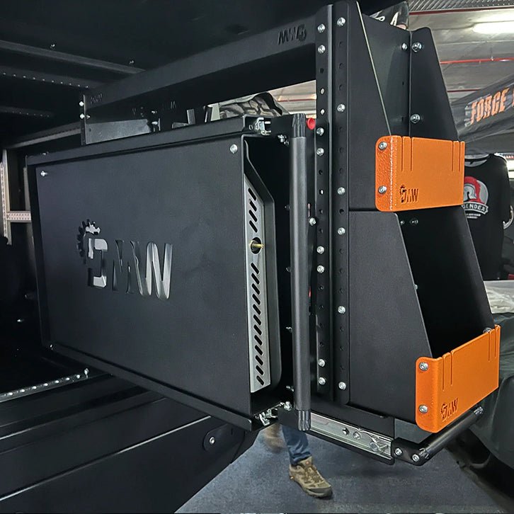 Load image into Gallery viewer, Side-mounted view of the DMW Compact Kitchen and Pantry unit inside a canopy. The system is partially openned, showing the branded DMW logo and orange powder-coated shelf brackets. Reinforced frame and slide rails are clearly visible, emphasizing the robust construction.
