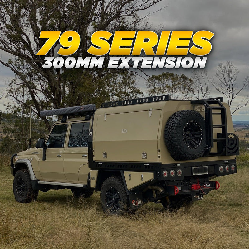 Load image into Gallery viewer, One popular upgrade for the 79 Series is a chassis extension, with options available in 300mm and 600mm. A 300mm chassis extension in a dual cab 79 Series significantly improves weight distribution beneath your tray and canopy, resulting in better ride comfort and handling.
