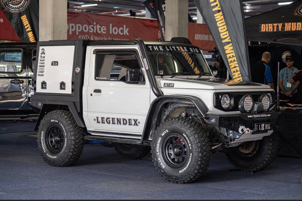 Side view of a Suzuki Jimny with a DMW XTR Aluminium Tray and Canopy.